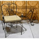 A modern 20th century design pier table with scrolled bronzed metal frame, and smoked glass top, 112