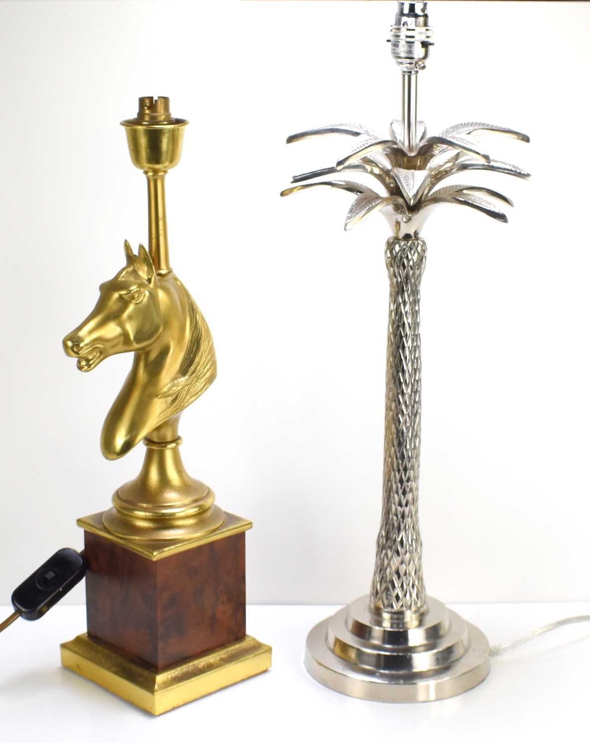 Two decorative table lamps, one formed as a horses head, in bronzed metal on burr yew pedestal base,