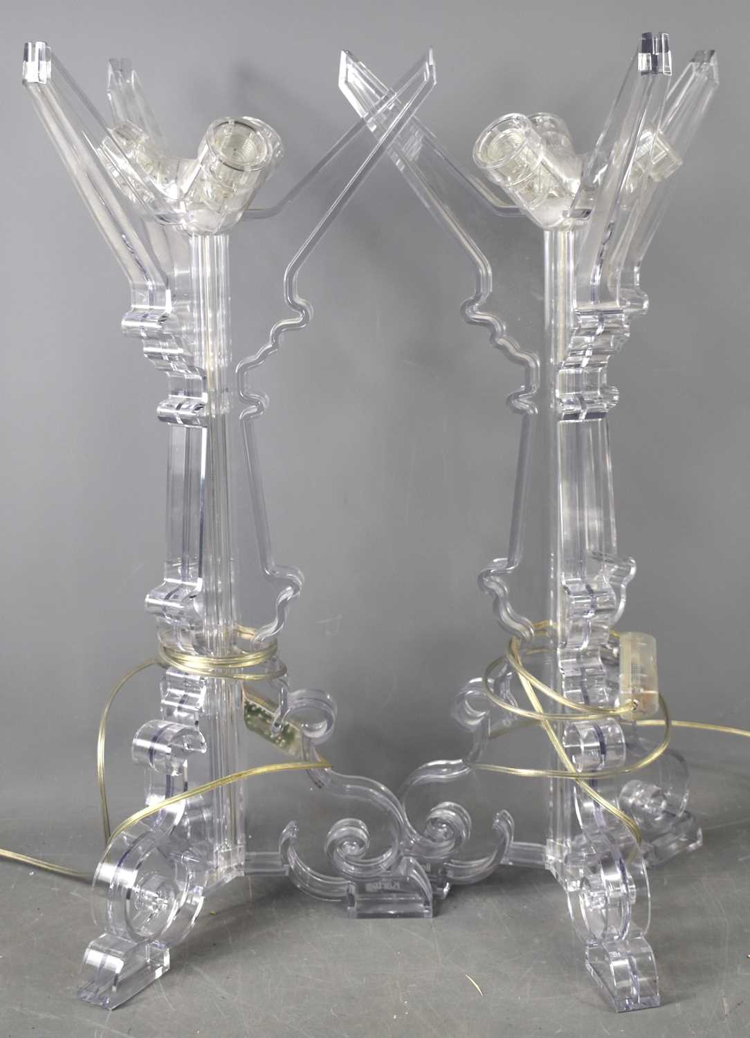 A pair of Kartell Bourgie table lamps designed by Ferrucio Laviani, of clear form, 63cm high.