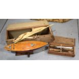 A model wooden sailing boat, with original box. A/F, together with a pine tool box containing
