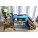 A Clarke planer thicknesser together with a Fern fretsaw and a Nordstrom five speed bench drill.