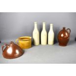 A quantity of antique stoneware items to include three grey bottles, one stamped "ALANGERON & SES