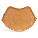A Robert "Mouseman" Thompson oak kidney shaped tea tray, with a carved mouse to each handle, 48cm