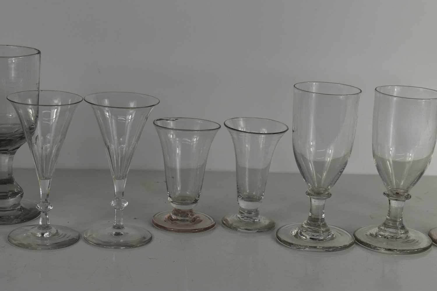 A selection of antique glasses including Georgian and Victorian examples, of various size and form. - Image 2 of 4