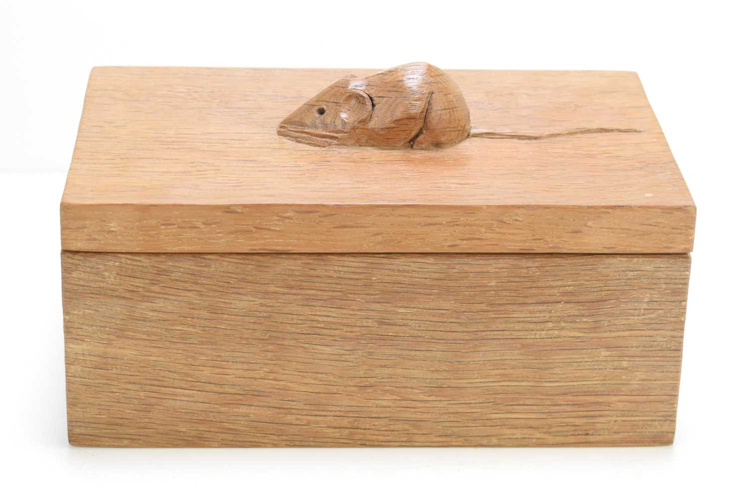 A Robert "Mouseman" Thompson oak lidded box with carved mouse to the lid.