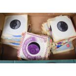 A collection of 7" singles to include nine Elvis Presley singles, Buddy Holly, Fats Domino. The