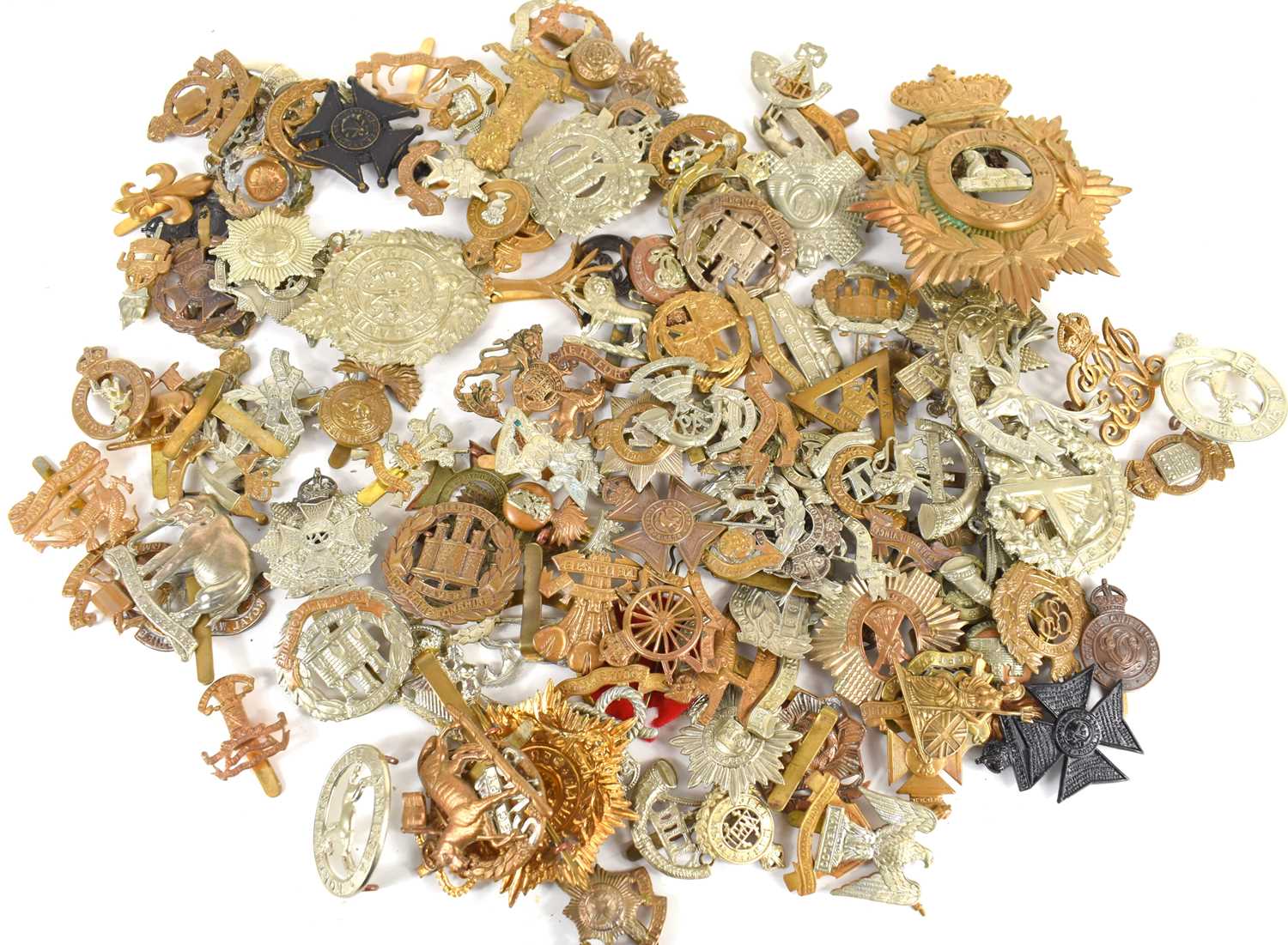 A large group of 19th century and later military cap and pin badges to include Herefordshire Light