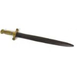 An early 19th century French artillery short sword with double edged blade, brass hilt and