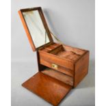 A Victorian Campaign style mahogany Gentleman's vanity case, with inset brass handle to the top,