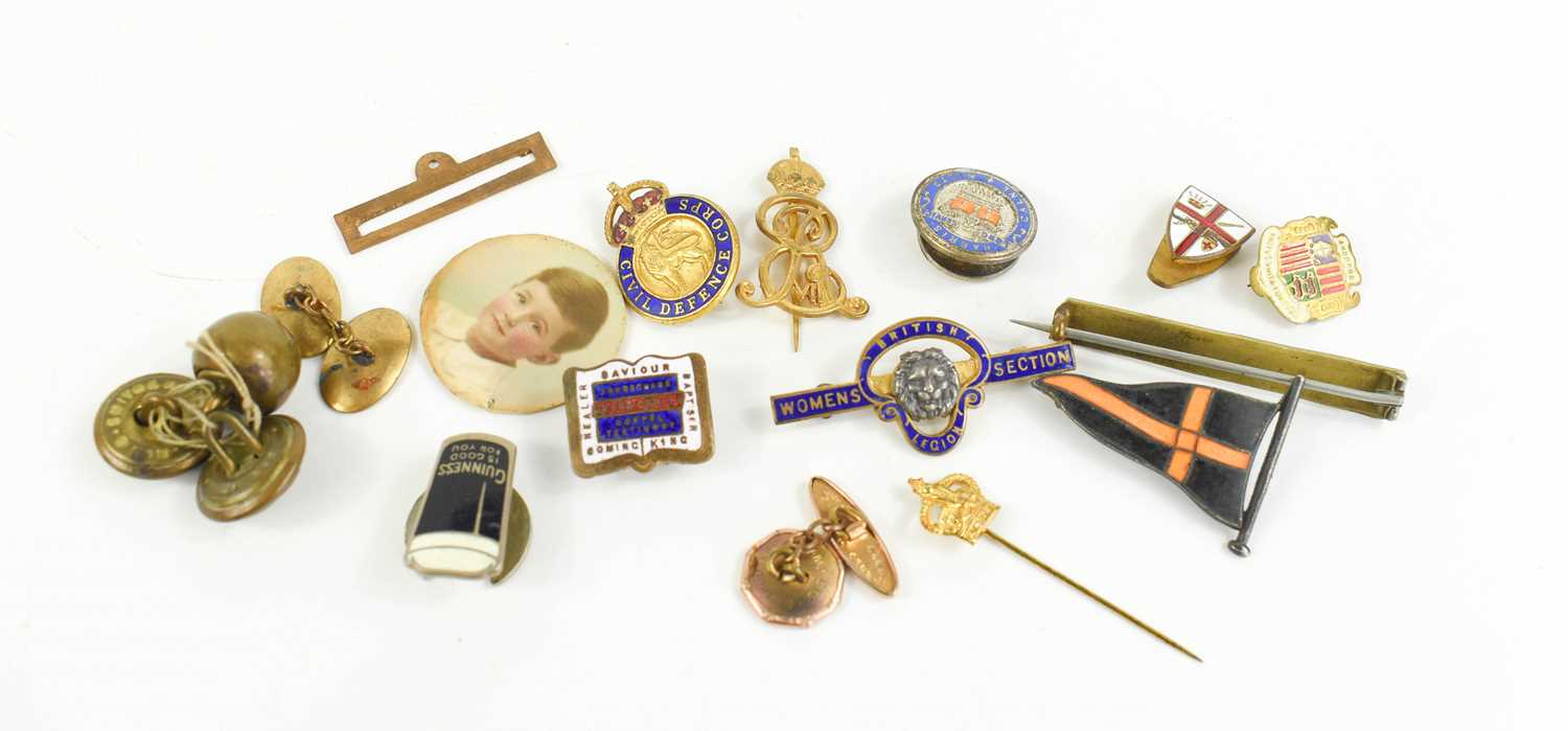A gold plated stick pin with the ensignia of King Edward VII below a coronet, another with his