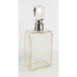 An early Art Deco Edwardian whisky decanter of sleek rectangular form with silver collar and cut