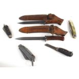 Three military Jack Knives to include a WWII dated example, together with two bayonets and leather