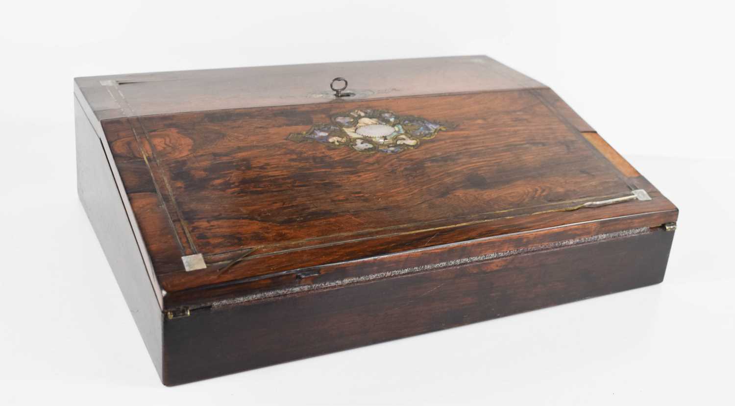 A 19th century rosewood and mother of pearl inlaid work box, the sloped lid opens out to reveal a