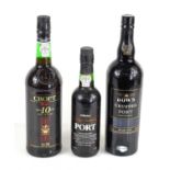 A group of port comprising a bottle of 2002 Dow's Crusted port, Croft ten year old port and a half