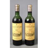 Two bottles of vintage Chateau La Mission Haut Brion, Grand Cru Classe 1966 red wine.