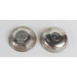 A pair of white metal decorative dishes, each set with silver arabic coins, 2.7toz.