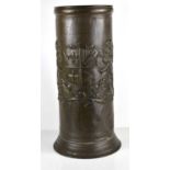A bronzed stick barrel with, planished finish and a coat of arms depicting two lions holding a