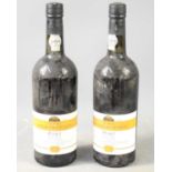 Two bottles of 2003 Wine Society's crusted port.