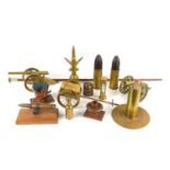 A collection of Trench Art to include two German WWI dated brass shells, brass hour glass, two