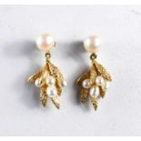 A pair of 14ct gold and pearl drop earrings in the form of leaves and berries, 5.18g.