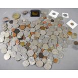 A quantity of GB and worldwide coinage and medallions to include a silver medal commemorating the