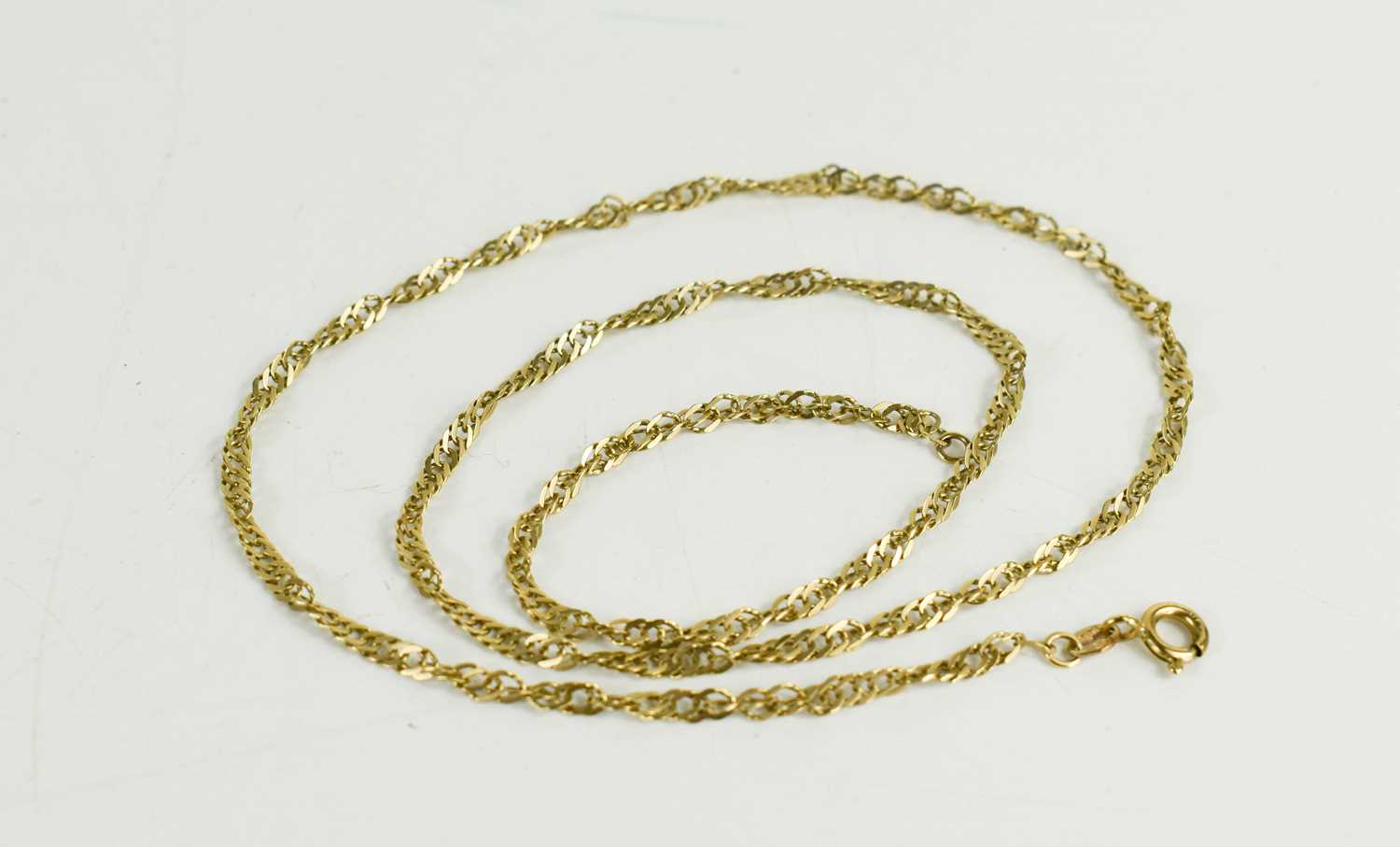 A 9ct gold two strand curb link twist chain, 51cm long, 4.17g.