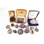 A group of silver and enamel medals and medallions, including Stroud and District Amateur Football