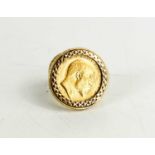 An Edward VII gold half sovereign set in a 9ct gold ring mount, 8.6g.