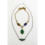 Egyptian Revival interest, a three form scarab pendant of green, blue and tawny coloured stones,