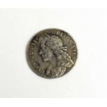 A James II silver shilling, dated 1685.