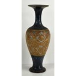 A Doulton Lambeth vase, of baluster form, the body with impressed geometric motifs, to blue wash