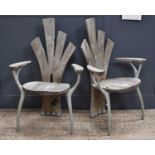 A pair of John Makepeace yew and cast aluminium garden chairs, of naturalistic design, with
