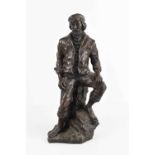 A Letts resin figure of a fisherman, signed to the back, 30cm high.