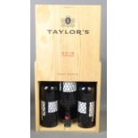 A case of six bottles of Taylors 2016 vintage port in unopened wooden case.
