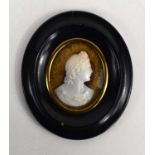 A 19th century cameo in the classical style of a gentlman in profile, in a miniature Hogarth frame.