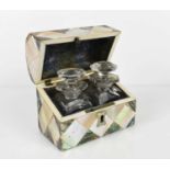 A mother-of-pearl inkwell holder, of domed rectangular form inlaid with white and abalone mother-