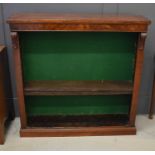 A mahogany bookcase, with plain frieze, two scroll brackets, and two height adjustable pegged