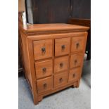 A hardwood Chinese style chest of drawers, 47 by 78 by 62cm.