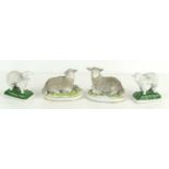 A pair of 19th century Sampson figures of sheep, gold anchor marks to the base and a further pair of