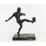 A spelter figure of a footballer on black marble base, 30cm high including base.Apparently unsigned,