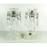 A near pair of Waterford cut glass lustres, each hung with ten paired droplets, 25.5cm high.There