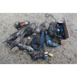 A group of power tools to include drills, angle grinders, reciprocating saw and other tools.
