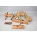 A group of woodworking planes.