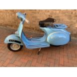 A vintage 1960 Douglas Vespa 152L2, 125cc, three speed, in classic blue livery with original plate.