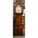 A Victorian mahogany longcase clock, by E Goodwin of Leicester with painted dial, the case having