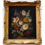 A late 19th / early 20th century oil on board, depicting vase of flowers, in gold painted frame.