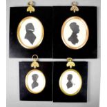 Four Georgian silhouette portraits, including two profile portraits of young girls, both