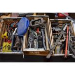 A large group of tools to include auger drill bits, socket sets, spanners, G-clamps, bolt cutters