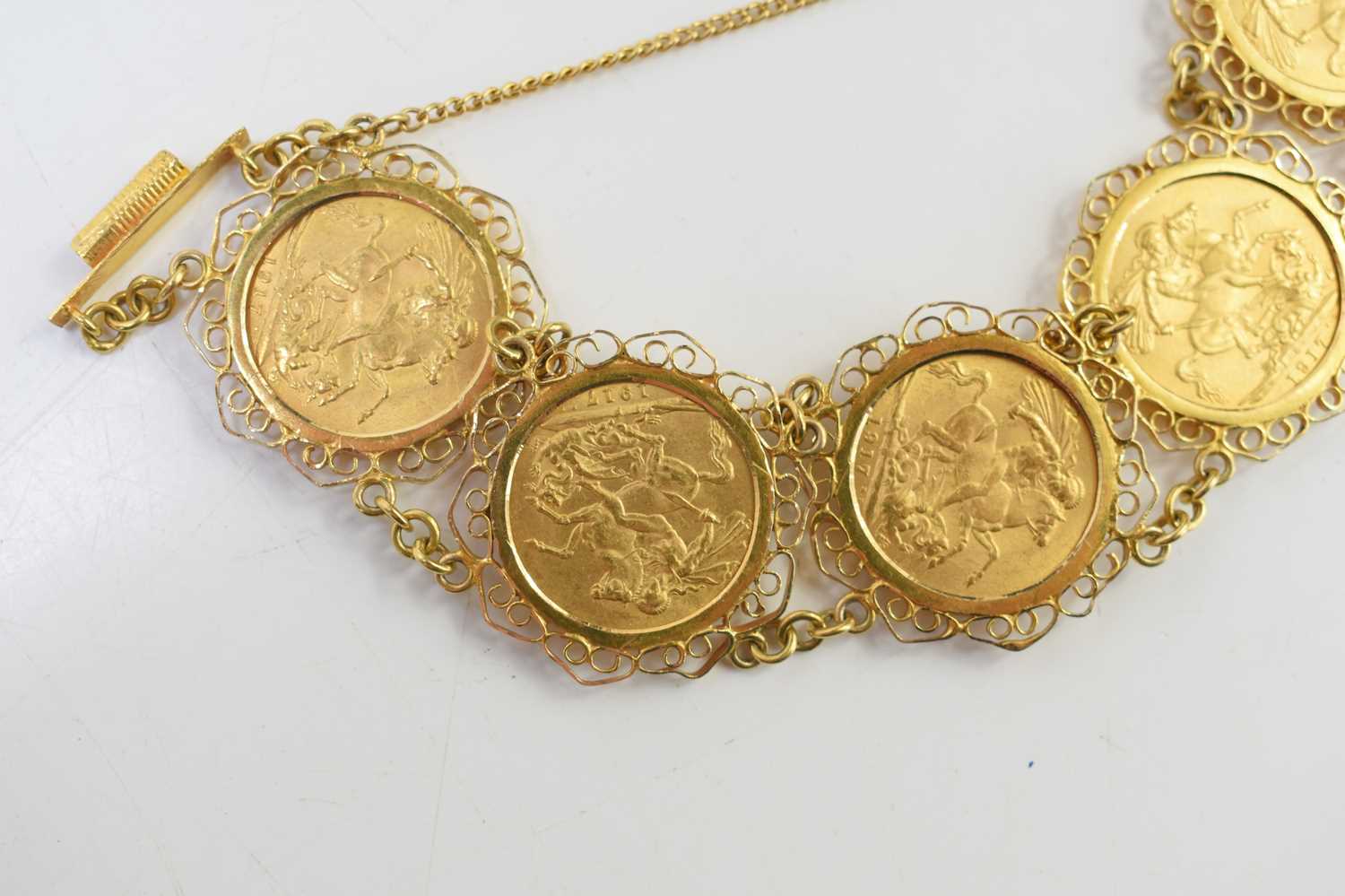 An 18ct gold sovereign bracelet set with five George V full gold sovereigns, all dated 1917 and with - Image 4 of 6