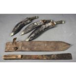 A WWII machete and leather sheath, the sheath stamped J.B Brooks 1940, the machete blade stamped